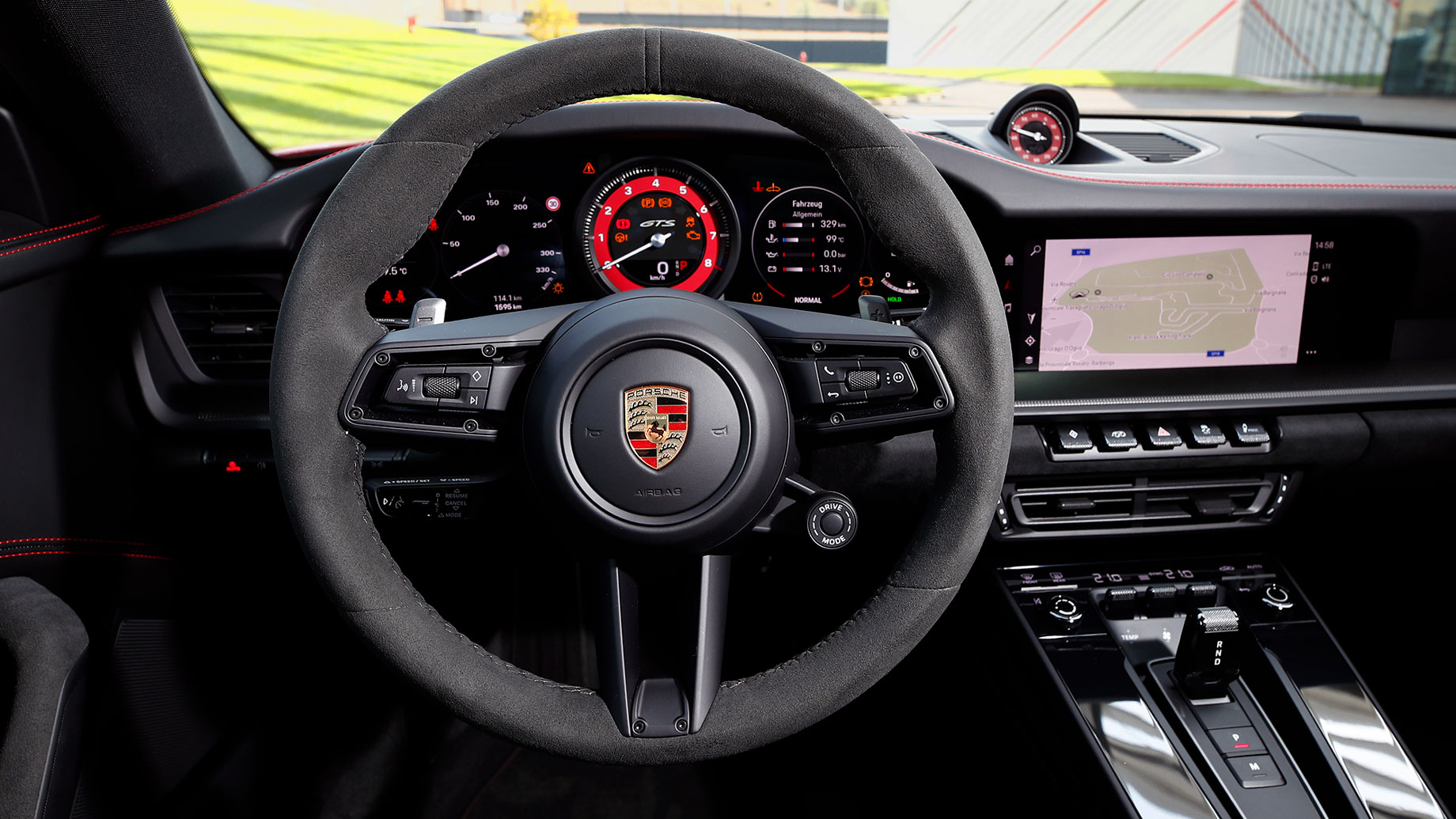 Getting Porsche 992 with the stick shift in the form of 911 GTS -  International Driving Authority